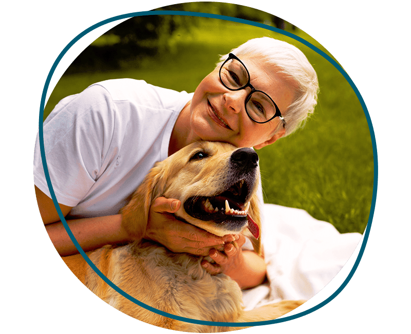 elderly person spendng time with their dog